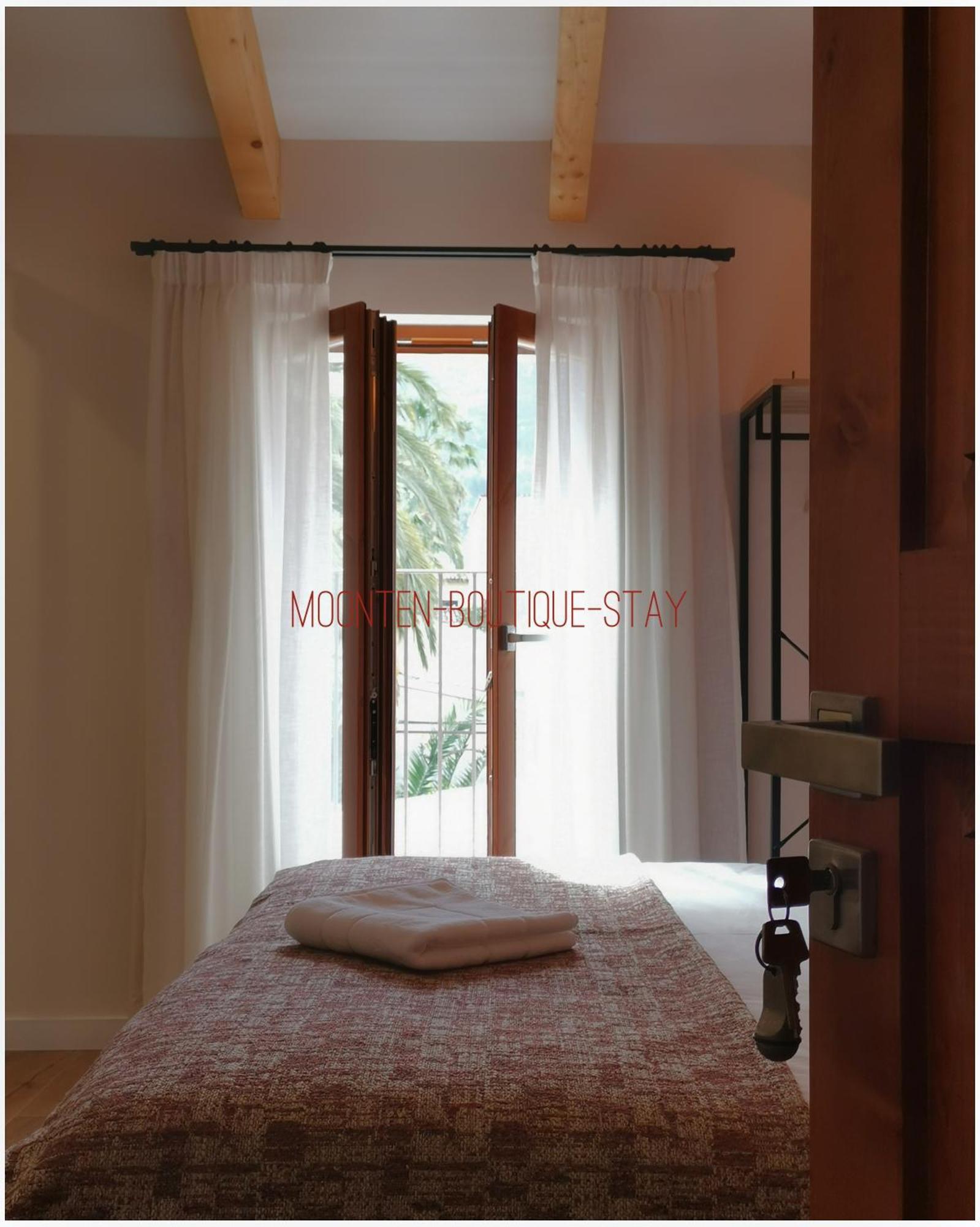 Moonten Boutique Stay Сольер Экстерьер фото